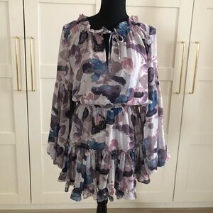 Buddy Love flowey pastel color ruffle and bloom sleeve dress .